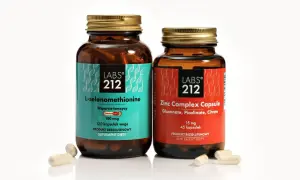 Dwie butelki suplementów diety: L-selenometionina i Zinc Complex Capsule. Idealne, by dowiedzieć się, co suplementować na diecie wegetariańskiej.
